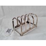 A five bar toast rack on bracket feet, 3" wide, Sheffield 1938 by EV