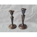 A pair of candlesticks matching with circular bases, 5.5” high, Birmingham 1962, boxed