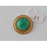 A Victorian malachite brooch with locket back 15ct gold