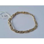 A cross link bracelet set with diamonds (0.50 cts) 9ct 7 inch 9.7 gms