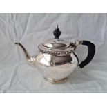An attractive Arts and Craft style tea pot almost bullet shaped, London 1929, 425g by CE