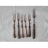 Four pistol handled dinner forks and two others