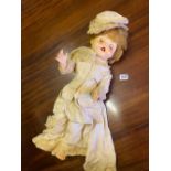 Cellular doll in Victorian dress with cap