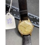 A GENTS OMEGA WRIST WATCH WITH SECONDS DIAL, 9ct GOLD, W/O