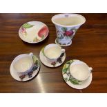 A Portmeirion Eden Fruit, three sups and saucers, a bowl plus a vase