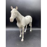 A white Beswick race horse, 11.5" high