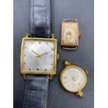 A square cased Avia wrist watch and two others