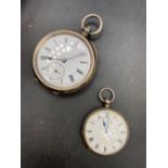 A Gents silver pocket watch W/O and ladies silver fob watch