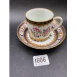 A Sampson cup and saucer with armorials, 5” diameter