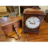 A Regency Period bracket clock, the front inlaid with brass, Pineapple finial, 19" high and a