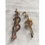 Two nice horse shoe stock brooches one X 15ct gold 4 gms one X 9ct 3 gms