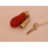 A Victorian carved coral and gold snake clasp