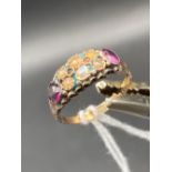 An antique 1884 gem set ring in 9ct size L