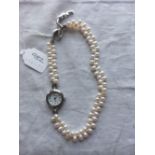 A ladies GIANNA wrist watch with synthetic pearl bracelet
