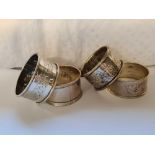 A napkin ring with beaded edges, another Birmingham 1910 and two others, 58g