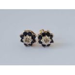 A pair of diamond and sapphire cluster earrings 9ct 2.2 gms