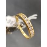 A seven stone diamond ring 18ct gold size P 2.8 gms