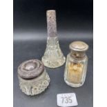 A tapering cent bottle with glass body (no stopper) and two other mounted jars