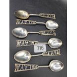 A set of six Malayan silver tea spoons with pierced handles, 54g