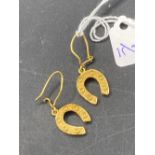 An attractive pair of vintage horseshoe 14ct gold earrings 6.1g