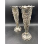 A large pair of spill vases with pierced embossed V shaped stems, 10" high, Birmingham 1903 by SG,