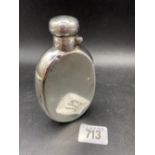 An Edwardian oval flask of curved outline, bayonet cover, 4.5" high, Birmingham 1910 by MB, 95g