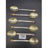 A set of six Chester tea spoons The Thistle shaped finials with purple and orange flower heads, 1911