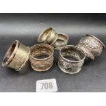 A group of three embossed napkin rings, Birmingham 1904 and three others, 136g