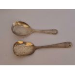 A caddy spoon with reeded edge, Birmingham 1935 by WHH and a jam spoon