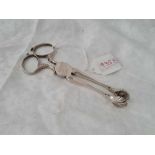 Pair of scissor shaped Sugar Tongs, with shell nips.