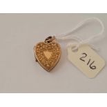 Victorian 9ct gold back & front heart locket with chased decoration.