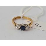 A three stone sapphire and diamond ring 18ct gold size K 2.4 gms