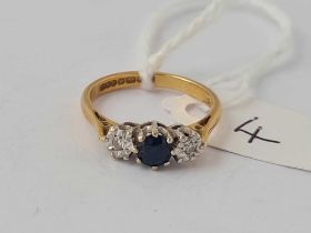 A three stone sapphire and diamond ring 18ct gold size K 2.4 gms