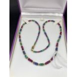 A sapphire ruby and emerald bead necklace 9ct 11.5 gms