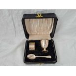 A Christening set of an egg cup, napkin ring and spoon, Sheffield 1935, 79g