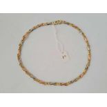 A FANCY NECK CHAIN 9CT 16 INCH 21.6 GMS