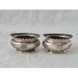 Pair of oval salts decorated with drapery, Sheffield 1907 by W&H