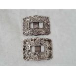 A pair of small Scottish buckles with chased decoration, 2" wide, Glasgow 1951, stamped LECKLE,