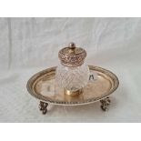 An oval Victorian ink stand with cut glass and mounted ink pot, 6" wide, London 1891 by JNM