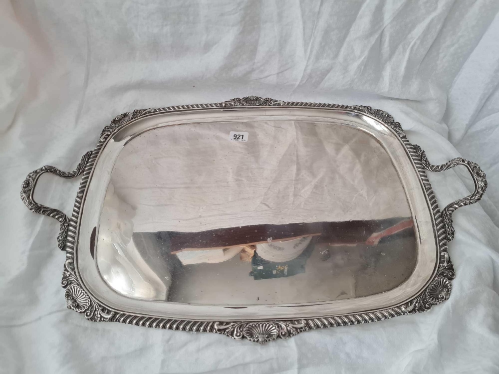 A good Georgian style tray with gadroon and shell border, plain centre, 25" over handles, London