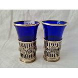 A pair of vases with pierced glass bases and rims, blue glass bodies, 4 1/4" high, London 1897, 1