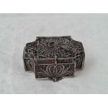 A shaped oblong silver filigree box, 2 1/4" long