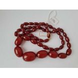 A string of red amber beads