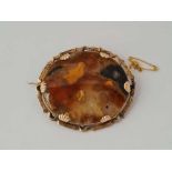 A large oval moss agate brooch in 9ct frame 5.5cm wide