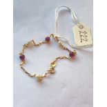 A pretty pearl and garnet bracelet