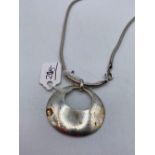 A silver deco whine label style pendant necklace