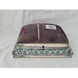 An attractive Art Nouveau jewellery box with enamel decorated body and upholstered hinged cover,7