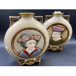 A good pair of Royal Worcester oriental style vases moon shaped 8 ½ inches high