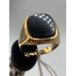 A black onyx signet ring 9ct size V 5.2 gms