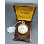 A slim ladies EXCALIBUR gilt fob watch with seconds sweep and date aperture W/O in original box